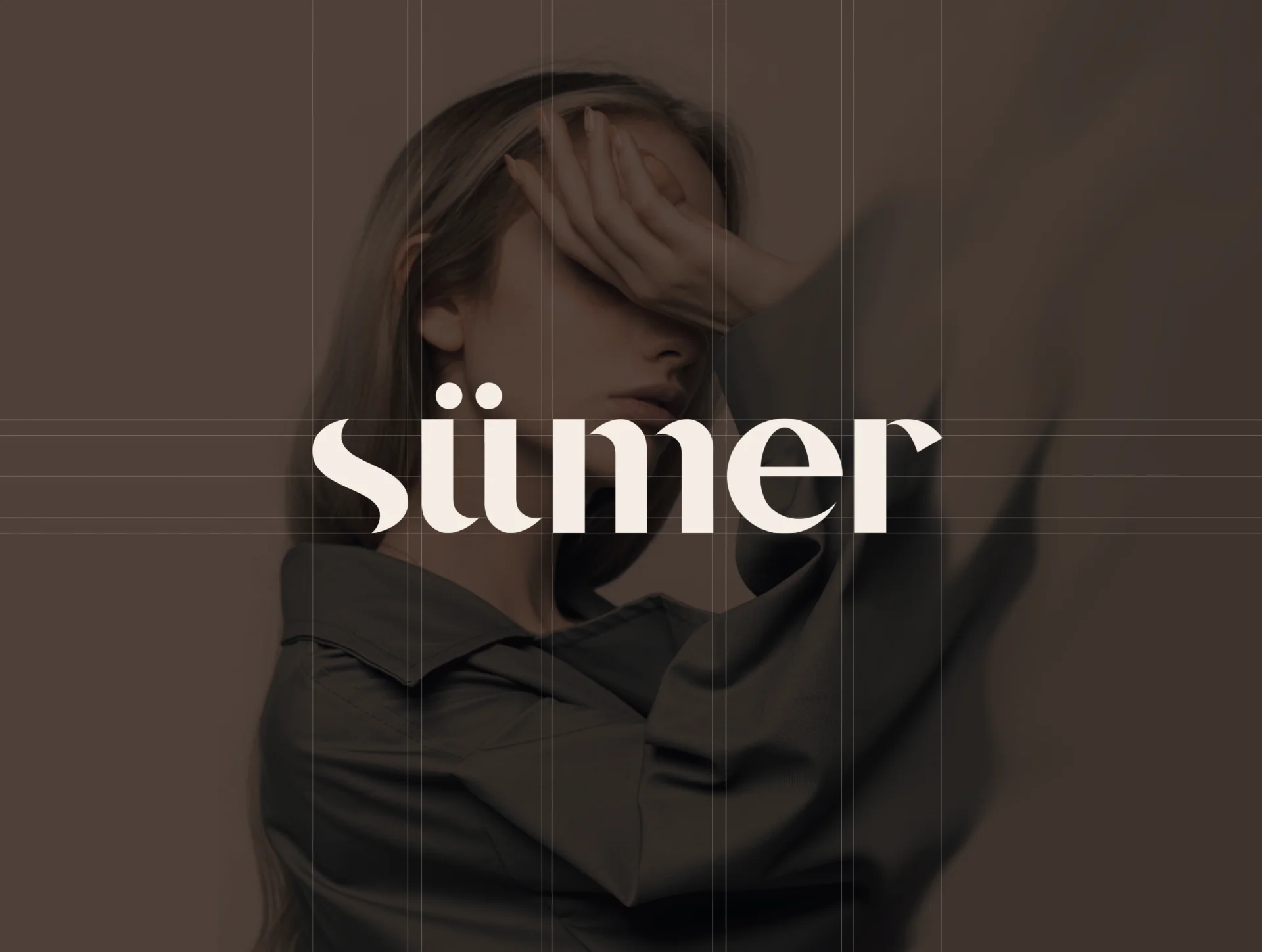 Sümer – logotype over a photograph